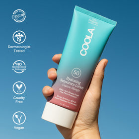 COOLA label close-up showing ingredient and reef-compliant details