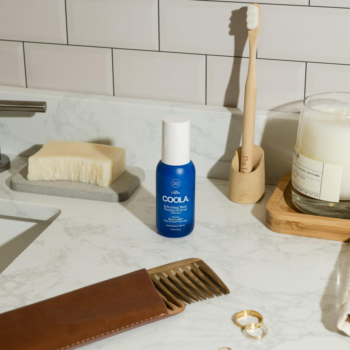 COOLA lifestyle beach use illustrating daily UV protection benefit