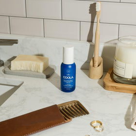 COOLA lifestyle beach use illustrating daily UV protection benefit