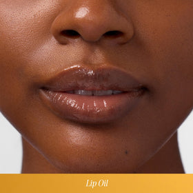 COOLA Liplux applied on lips demonstrating hydration and shine