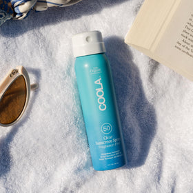 COOLA spray nozzle close-up demonstrating easy continuous application