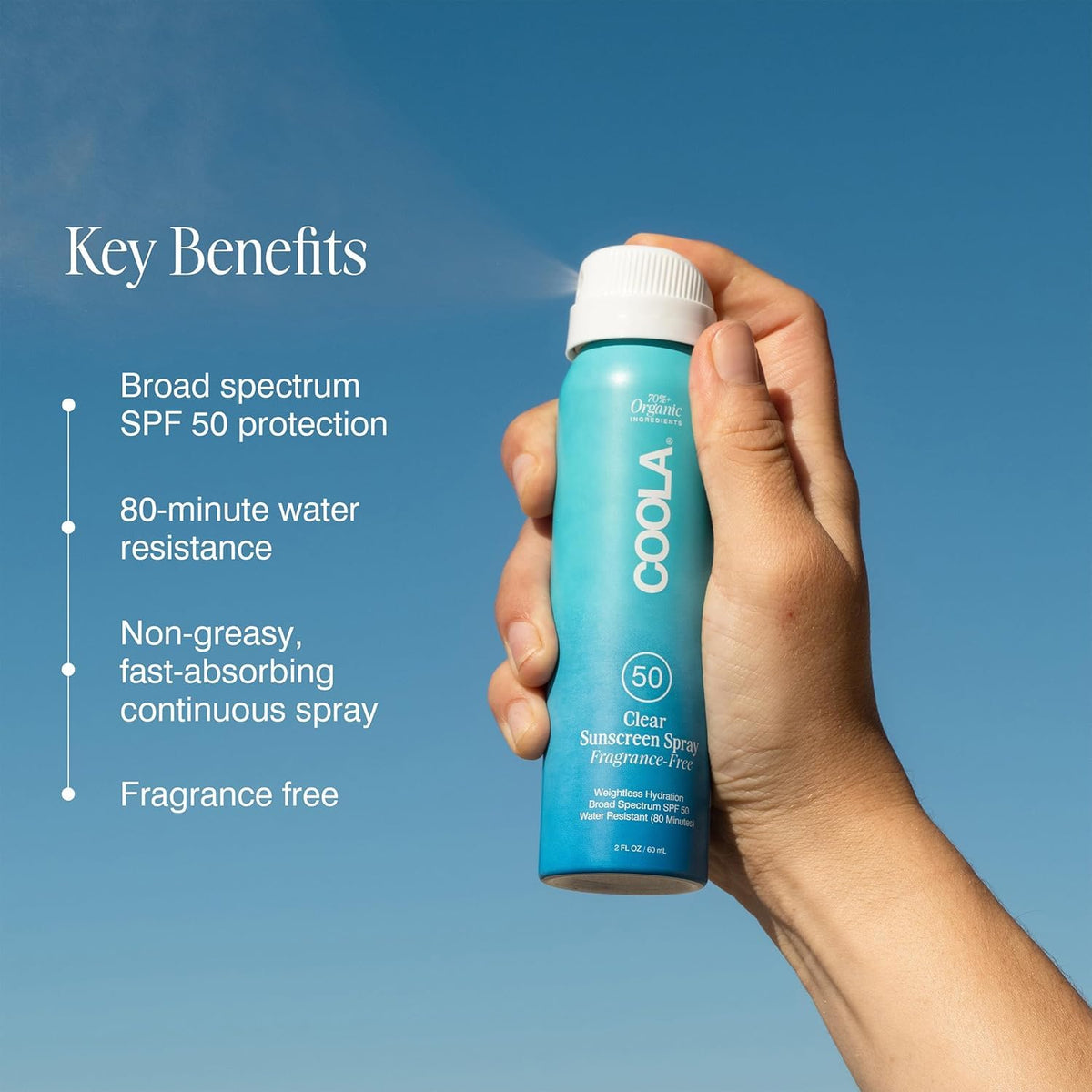 COOLA spray texture mid-air demonstrating lightweight quick-dry finish