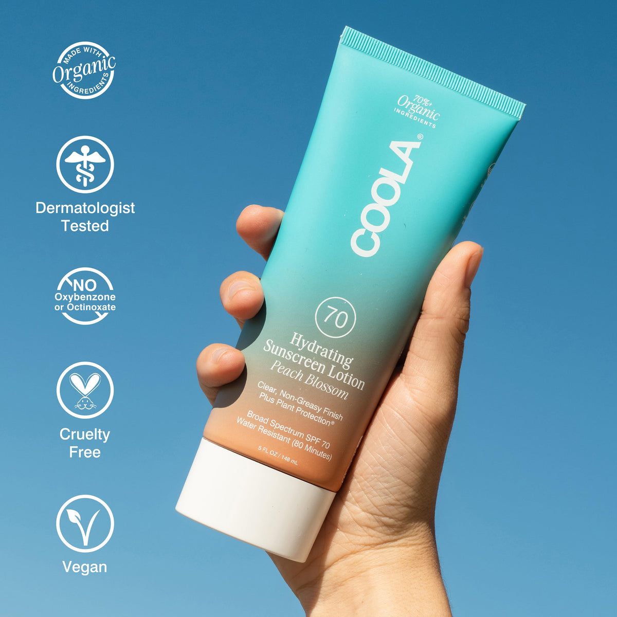COOLA sunscreen applied on arm illustrating even coverage and sheer finish