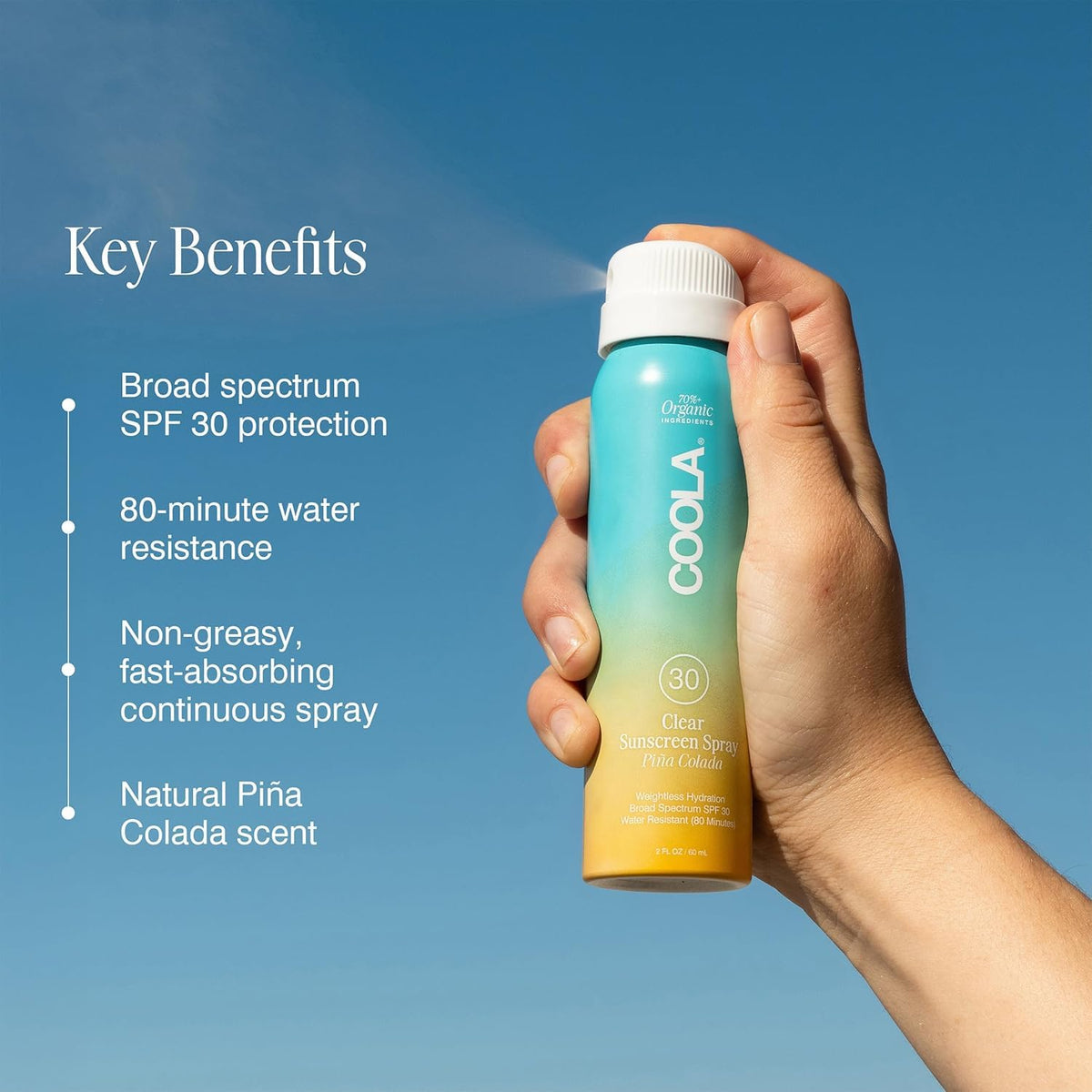 COOLA spray nozzle close-up for quick even application benefit