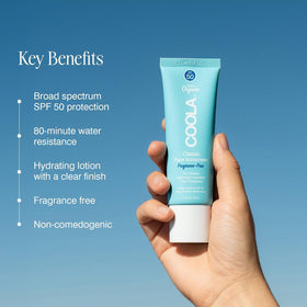 COOLA applying sunscreen to hand illustrating smooth, non-greasy finish