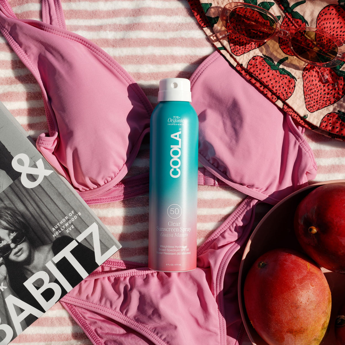 COOLA mist pattern on skin demonstrating even, non-greasy coverage
