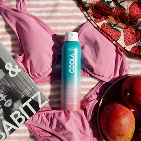 COOLA mist pattern on skin demonstrating even, non-greasy coverage
