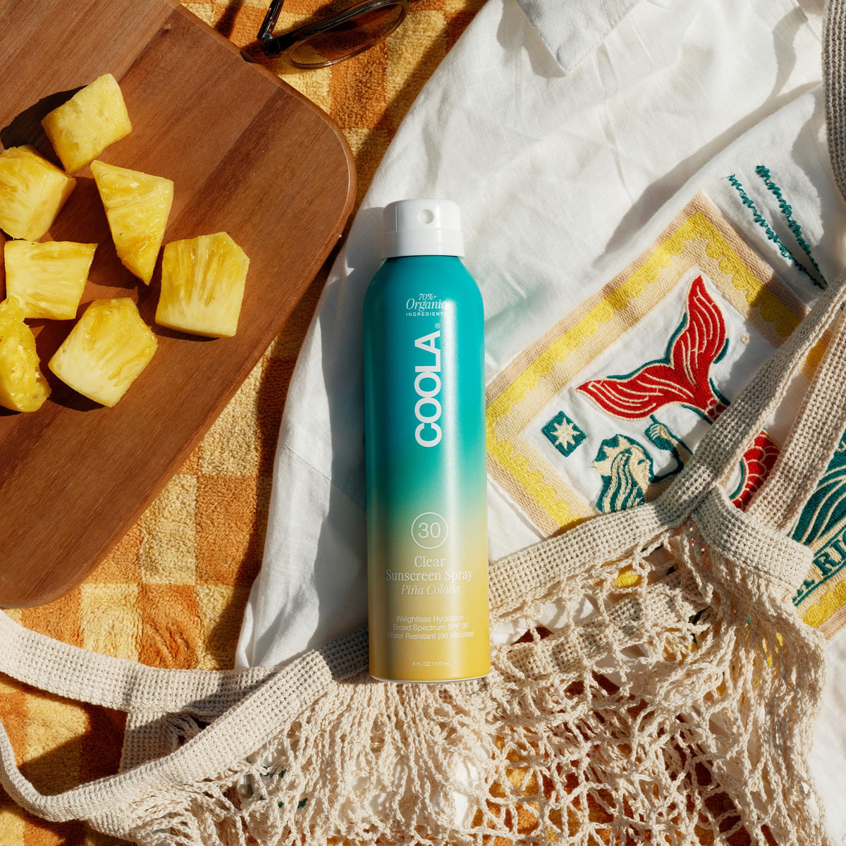 COOLA sheer texture on skin demonstrating fast absorption and no greasiness