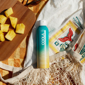 COOLA sheer texture on skin demonstrating fast absorption and no greasiness