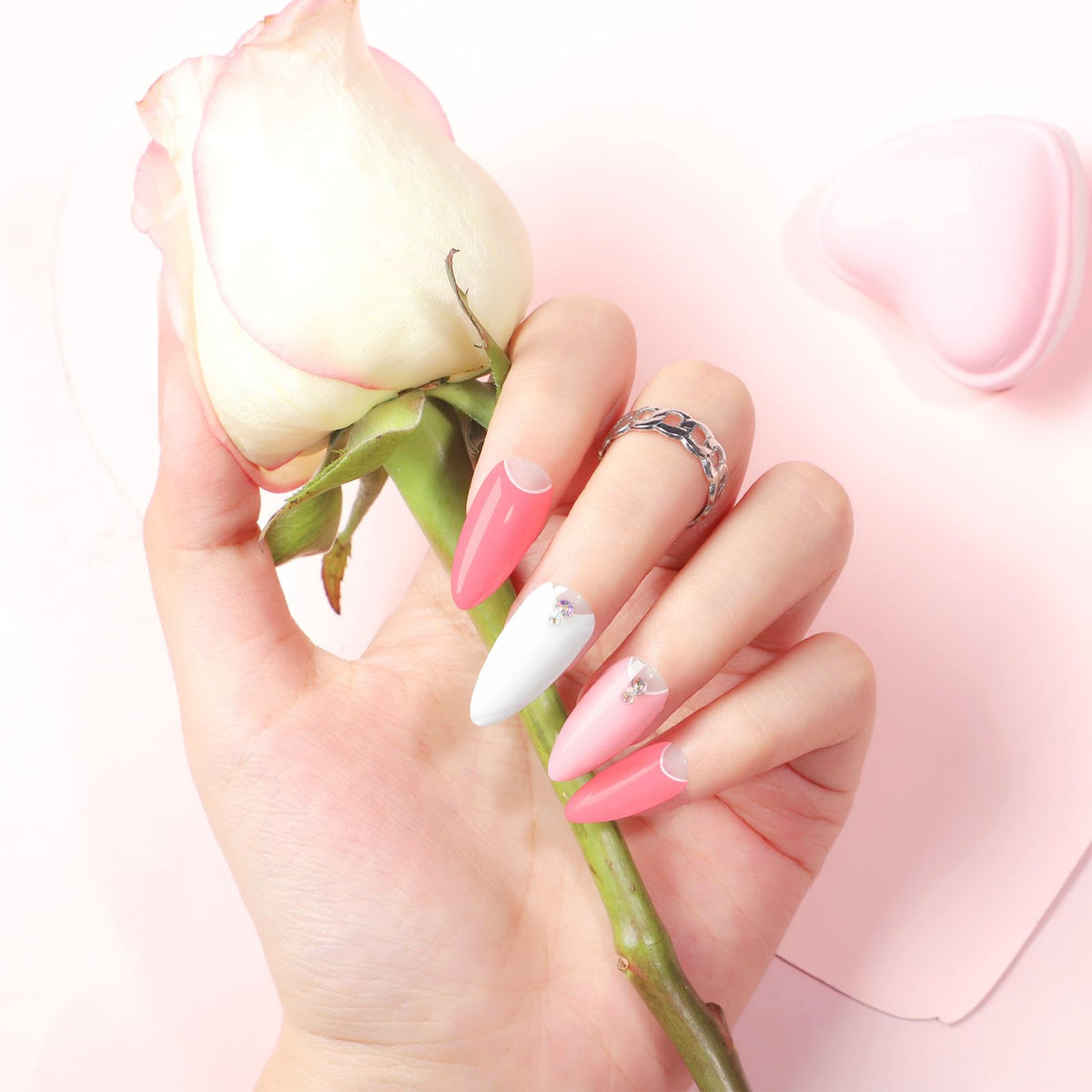 COSCELIA manicure on nails with varied colors demonstrating wearable shades