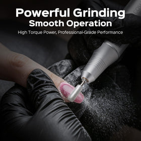 COSLUS E50 in-use during a manicure demonstrating smooth, quiet filing