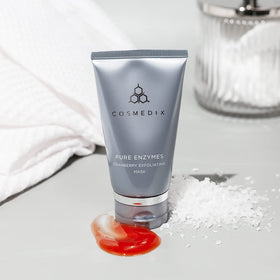 COSMEDIX mask in a spa-style setting conveying relaxing home treatment