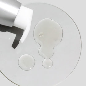 COSMEDIX Purity Solution beside a 100ml scale object showing compact travel-friendly size benefit