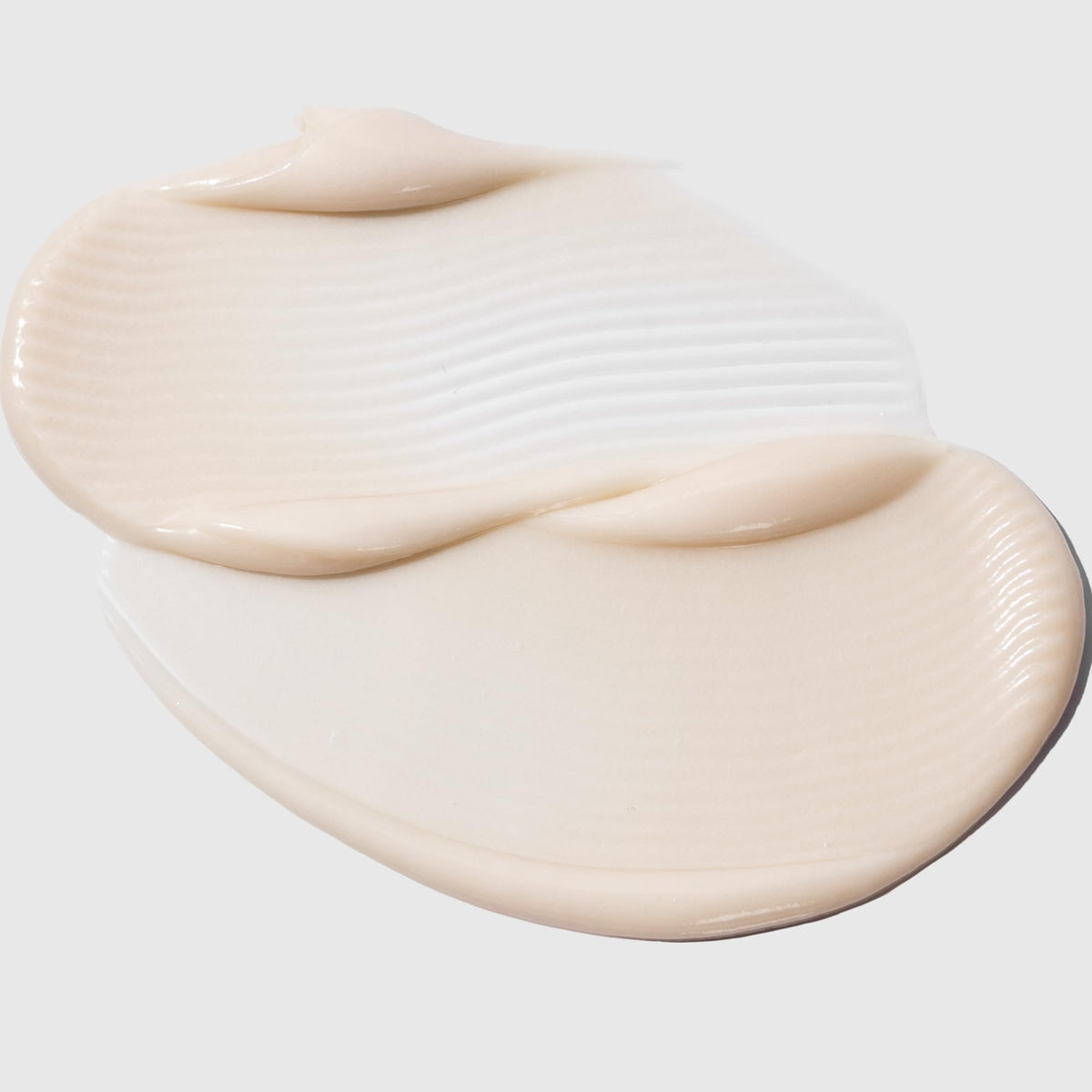 COSMEDIX under makeup swatch showing smooth, shine-controlled base