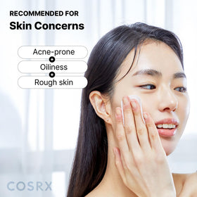 COSRX pad on hand demonstrating scale and easy application for travel