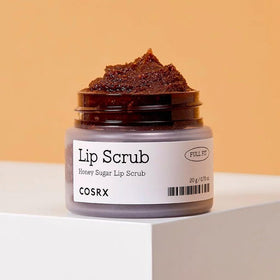 COSRX close-up of scrub texture showing sugar granules and creamy emollience