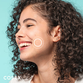 COSRX patch applied to facial blemish, conceals spot and protects skin