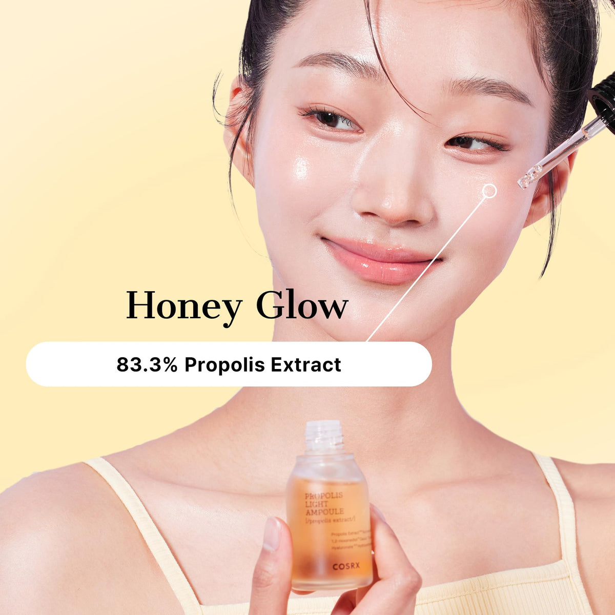 COSRX ampoule next to a hand to show 30ml scale and travel-friendly benefit
