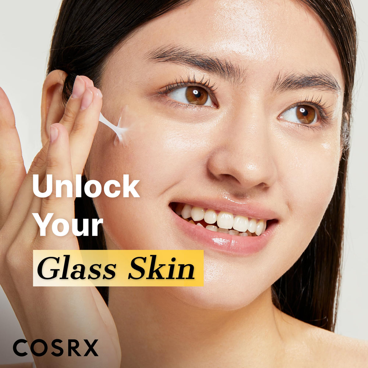COSRX cream on hand being applied demonstrating easy absorption