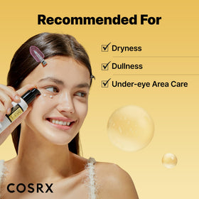 COSRX hand applying eye cream under eye demonstrating gentle patting technique
