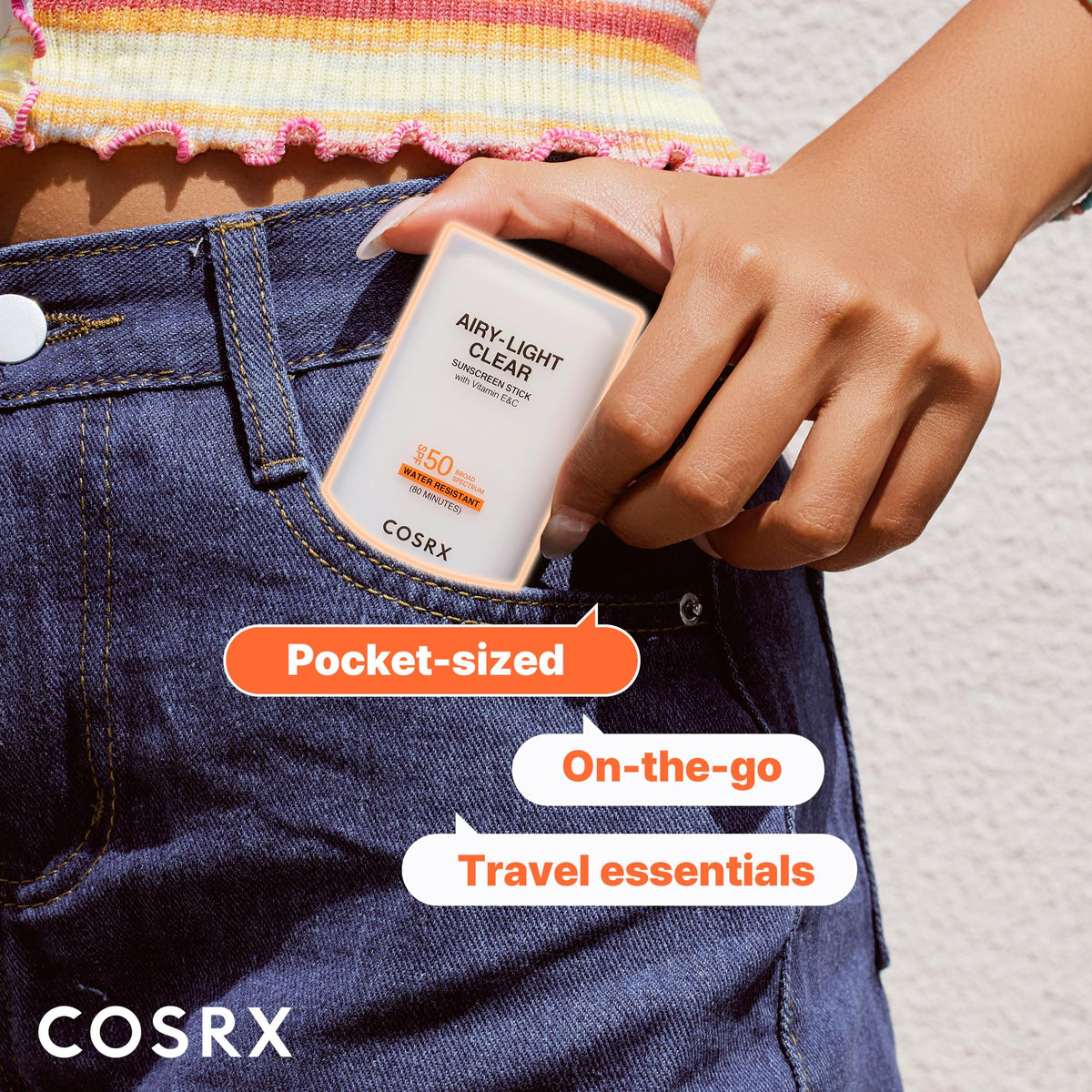 COSRX sunscreen stick inside a small bag ready for travel and on-the-go reapplication benefit