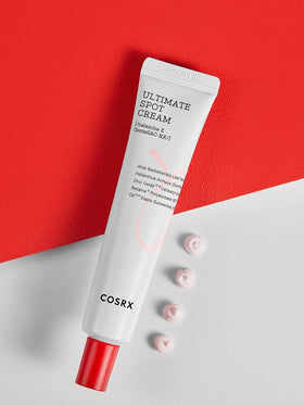 COSRX cream held in hand showing 30g scale and travel-friendly size