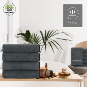 Cosy Family stacked cloths beside ruler to show compact scale