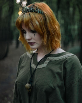 CoTeeZa on a Renaissance cosplay outfit showing costume compatibility benefit: character boost