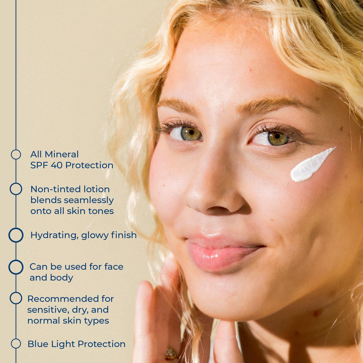 CoTZ applying to face by mirror showing non-tinted finish benefit