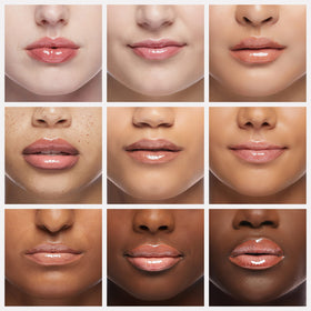 COVERGIRL clear top coat in lifestyle setting adds shine and hydrates lips