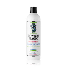 Cowboy Magic detangler being applied to hair showing instant slip benefit