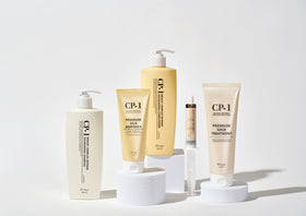 CP-1 bottle next to a hand showing 250ml scale and travel-friendly benefit