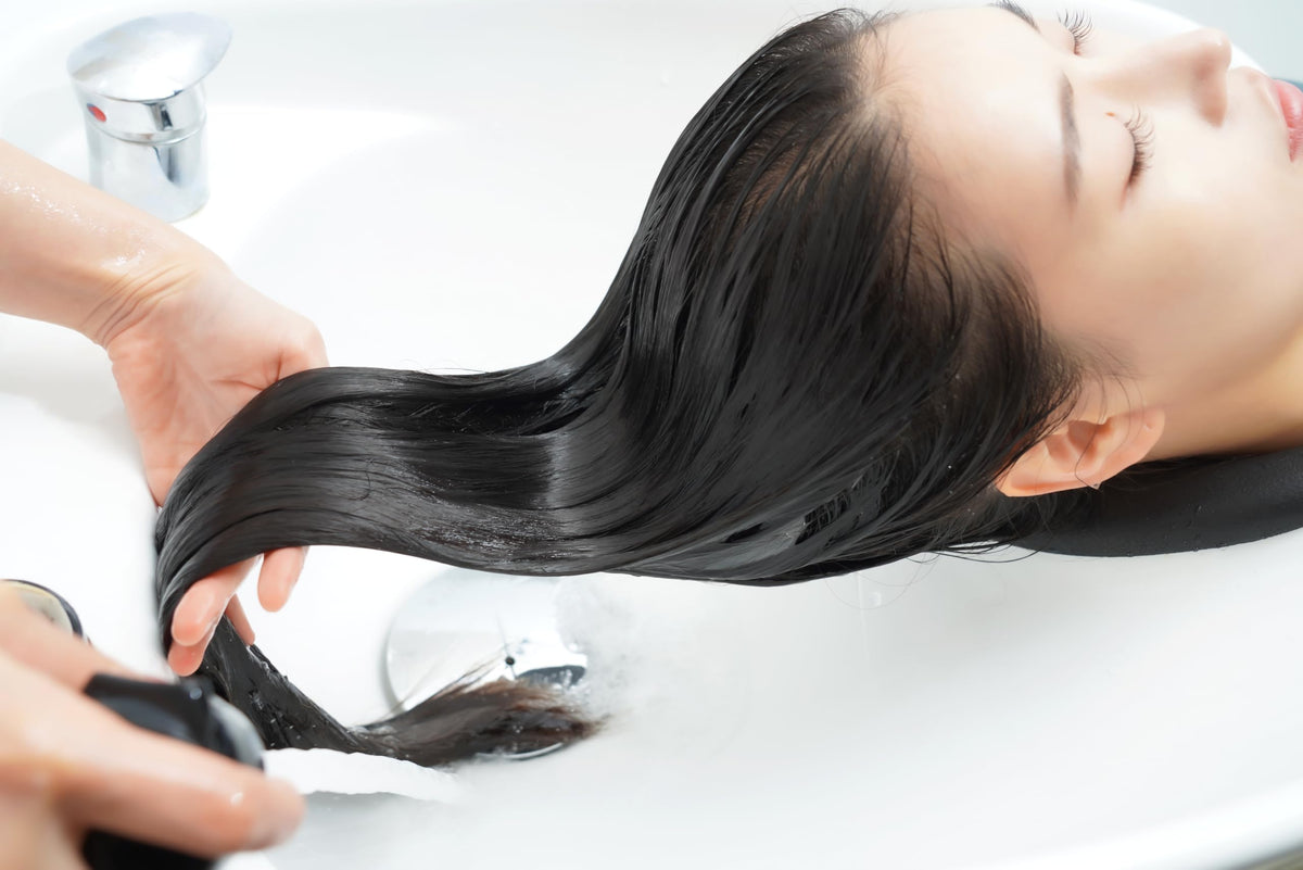 CP-1 creamy texture on hand demonstrating spreadability and conditioning benefit