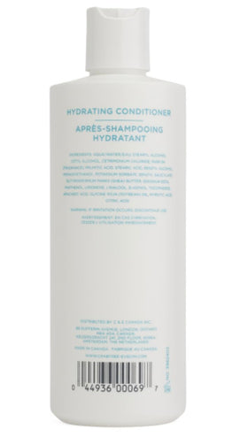 Crabtree & Evelyn conditioner texture close-up on hand, shows creamy formula for smooth hydration