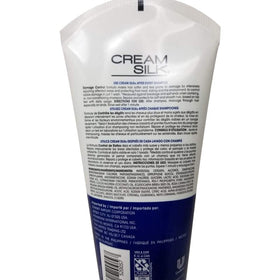 Cream Silk 350ml bottle beside common items showing family-size scale