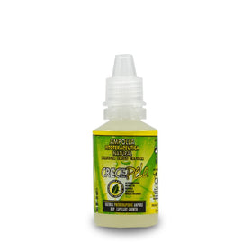 Crece Pelo bottles in hand showing product size scale for travel convenience
