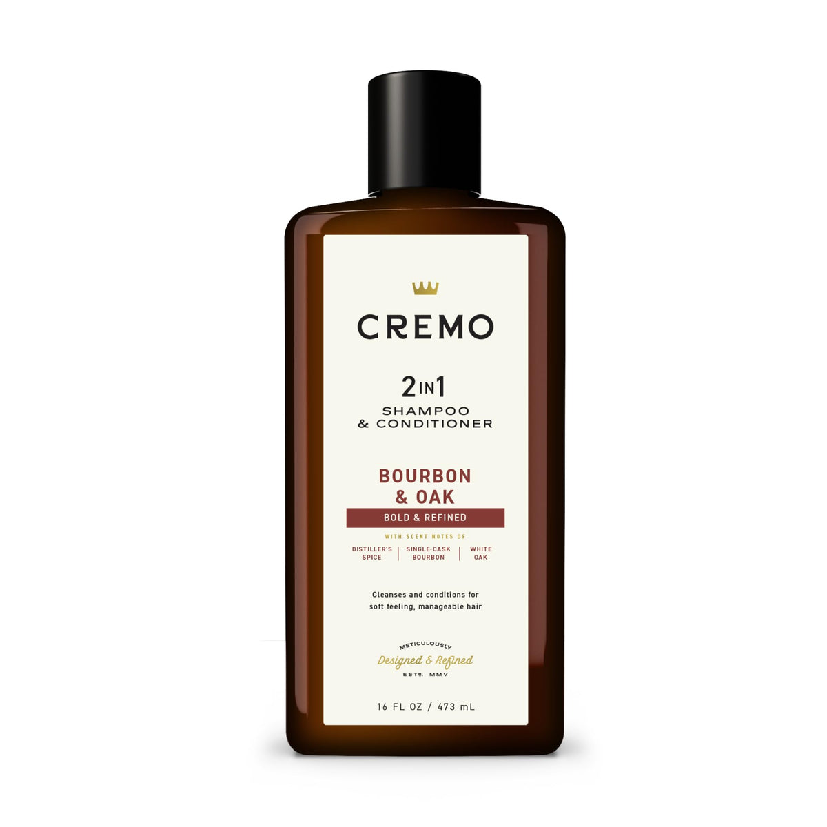 Cremo bottle next to hand showing true 16 fl oz size