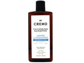 Close-up foam texture from Cremo shampoo showing rich lather and thicker hair benefit