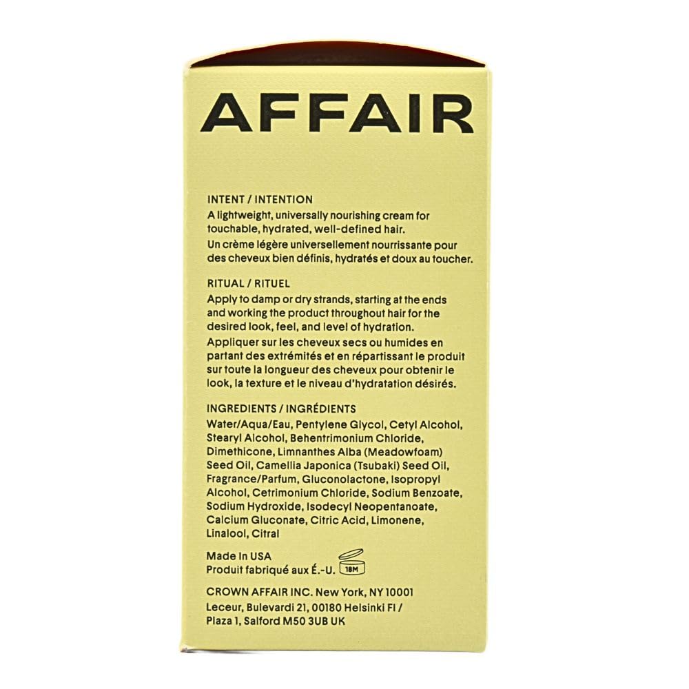 CROWN AFFAIR applying cream to damp hair for hydration and frizz control