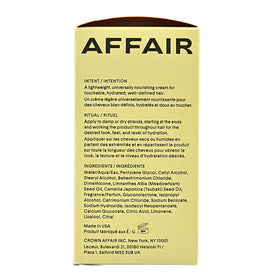 CROWN AFFAIR applying cream to damp hair for hydration and frizz control