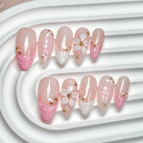 CTTHNBD front packaging showing almond pink floral nails and included items for quick styling
