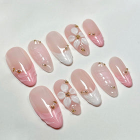 CTTHNBD nails in hand demonstrating size M fit and realistic almond scale for selection