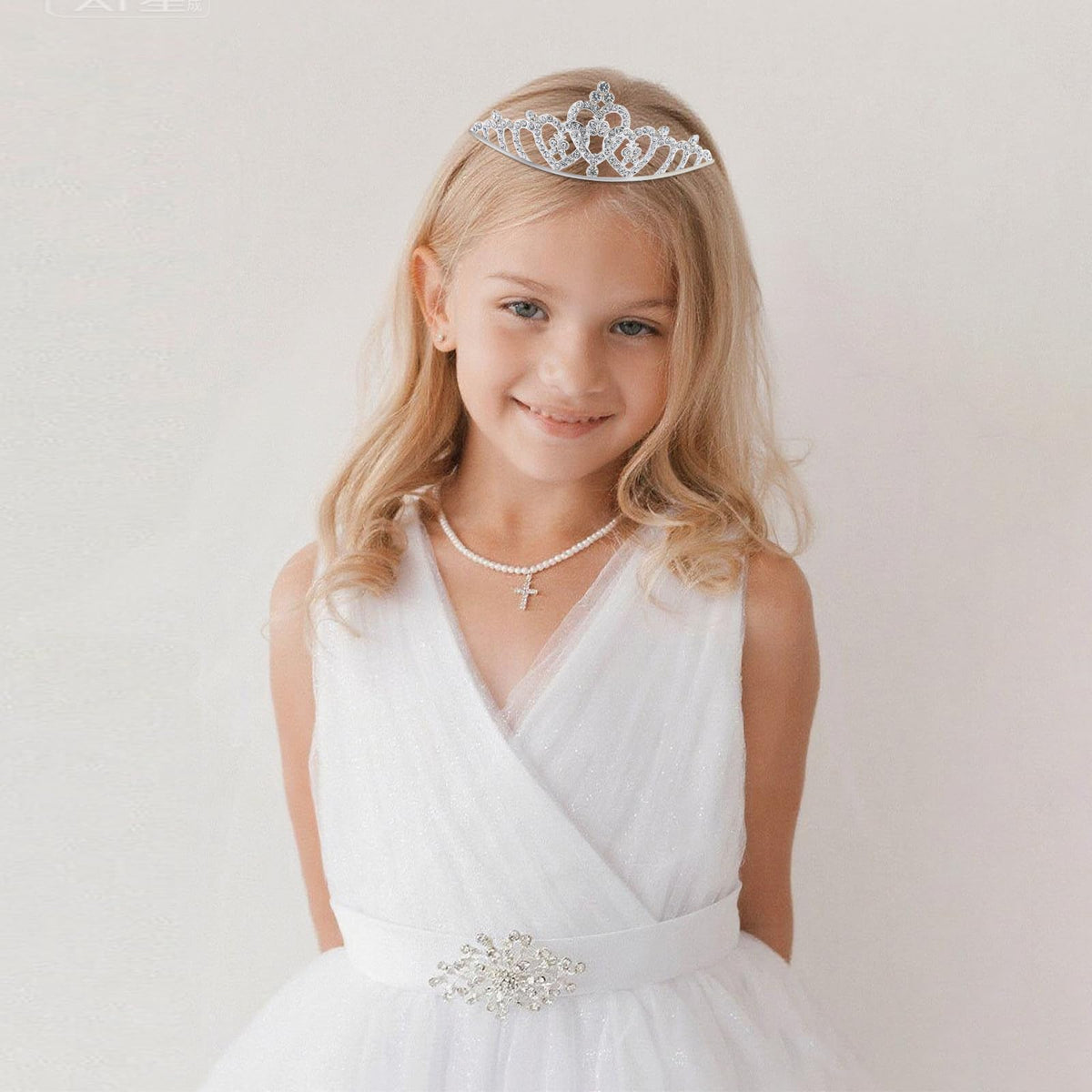 CUBACO little girl wearing a tiara at a party demonstrating festive look