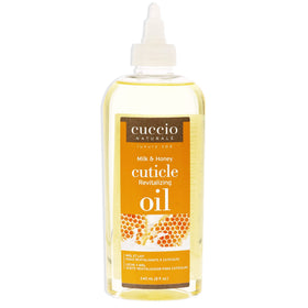 Cuccio front bottle showing milk and honey label, elegant packaging and salon-ready benefit