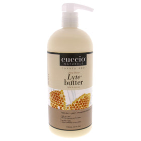 Cuccio Naturale Lyte front packaging showing 32 oz jar and milk and honey scent benefits