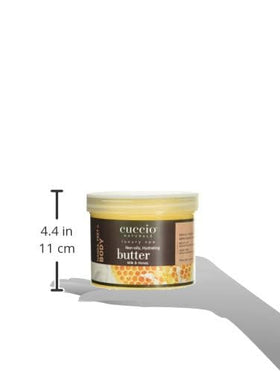 Cuccio label close-up highlighting milk and honey ingredients and quality