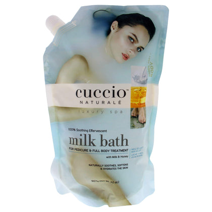 Cuccio Naturale front label of 32 oz milk bath highlighting nourishing ingredients and easy-pour bottle