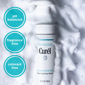 Curel 5 oz bottle next to hand showing size for travel and convenience