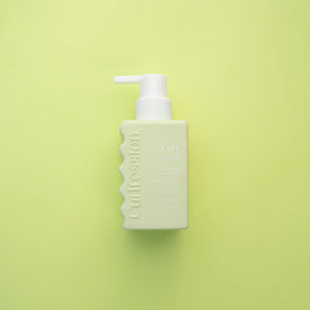 CURLFESSION next to common objects showing 8 oz scale and travel convenience