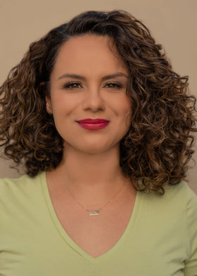CURLFESSION being applied to wet hair to improve curl definition benefit